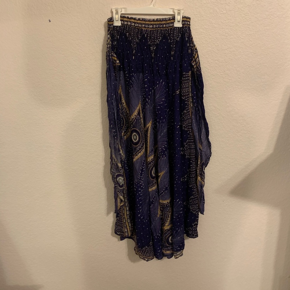 Made in Thailand, flowing skirt.